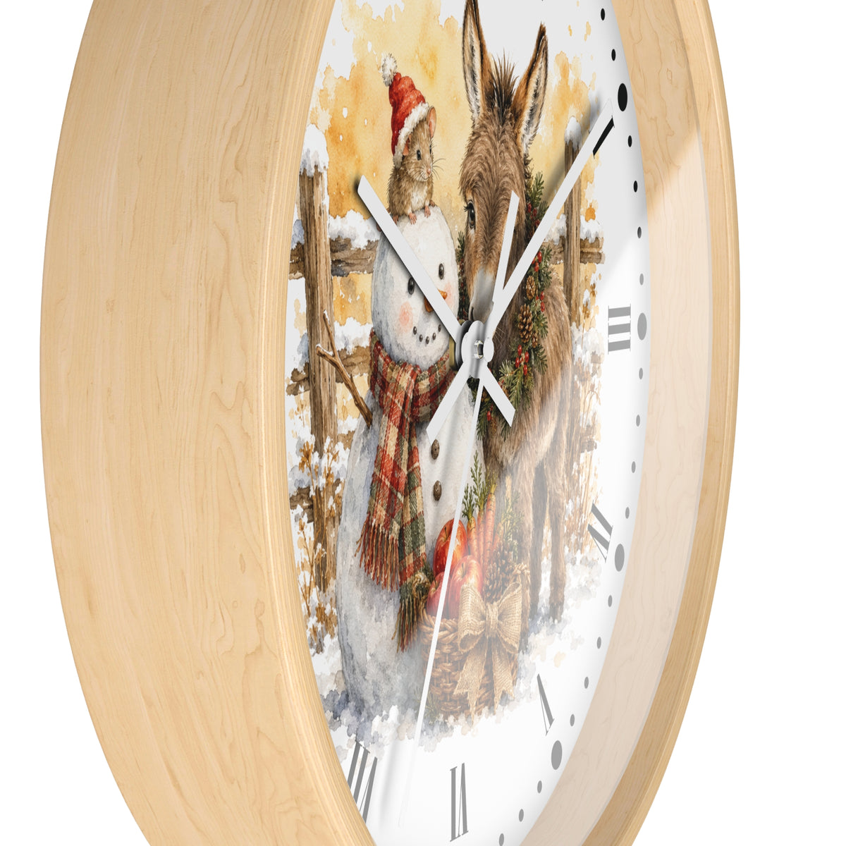 Round wall clock with a light natural wood frame and a festive winter illustration on the dial showing a rabbit in a Santa hat next to a donkey in a snowy outdoor scene.