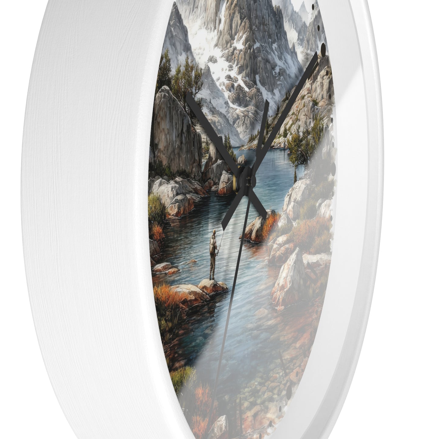 A white oval wall clock featuring a scenic mountain river landscape print with a fisherman on the water, shown against a plain white background.