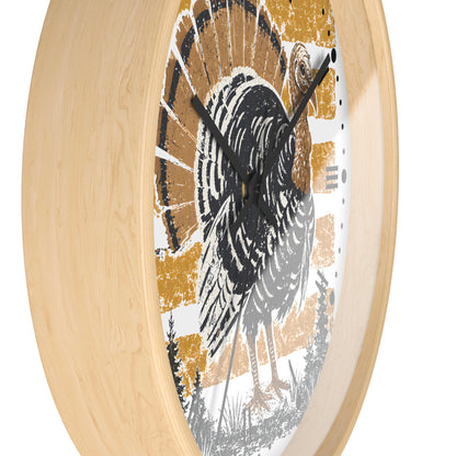 Round wall clock with a light natural wood frame and a distressed graphic of a wild turkey in black, white, and mustard yellow on the dial.