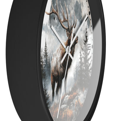 A round wall clock with a black frame and a printed scenic face showing an elk deer in a misty forest under a cloudy sky.