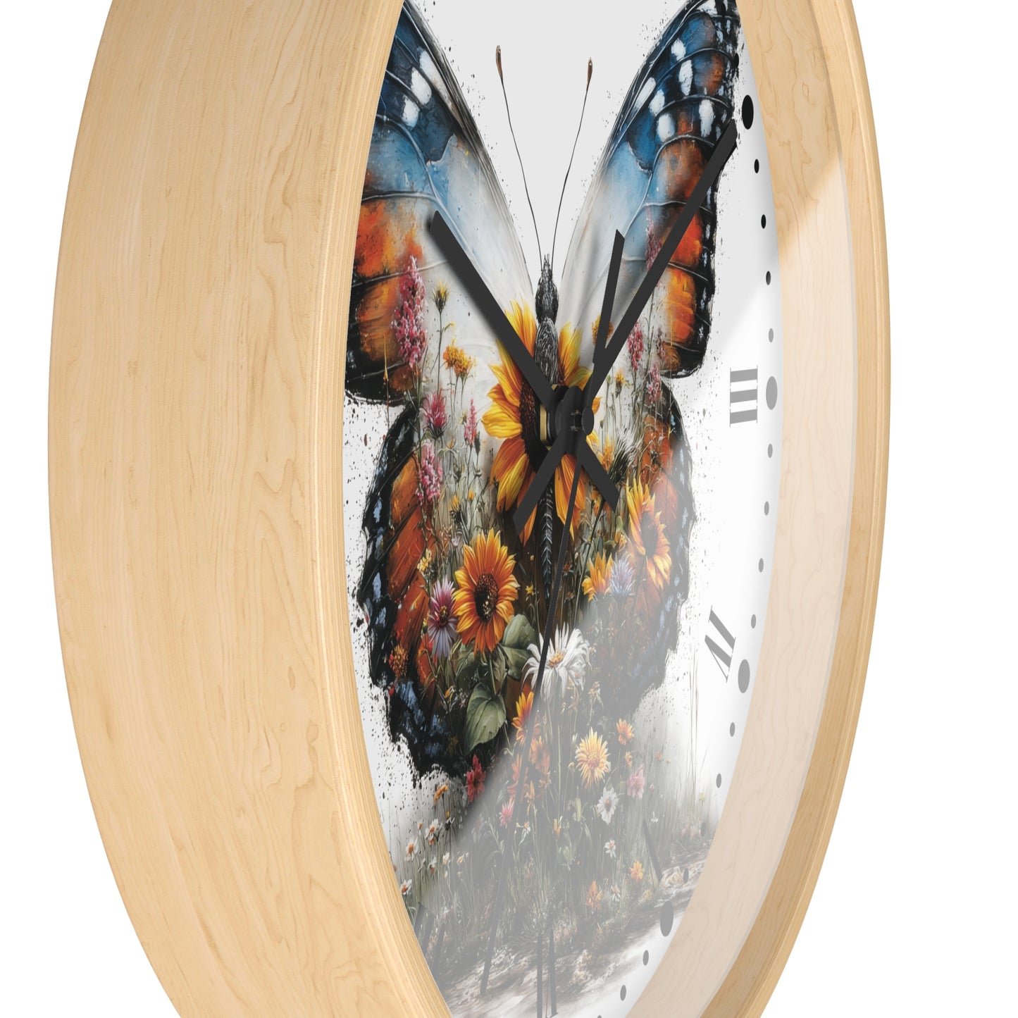 Round wall clock with a light natural wood frame and a white face featuring a large butterfly made of colorful flowers and leaves, shown on a white background.