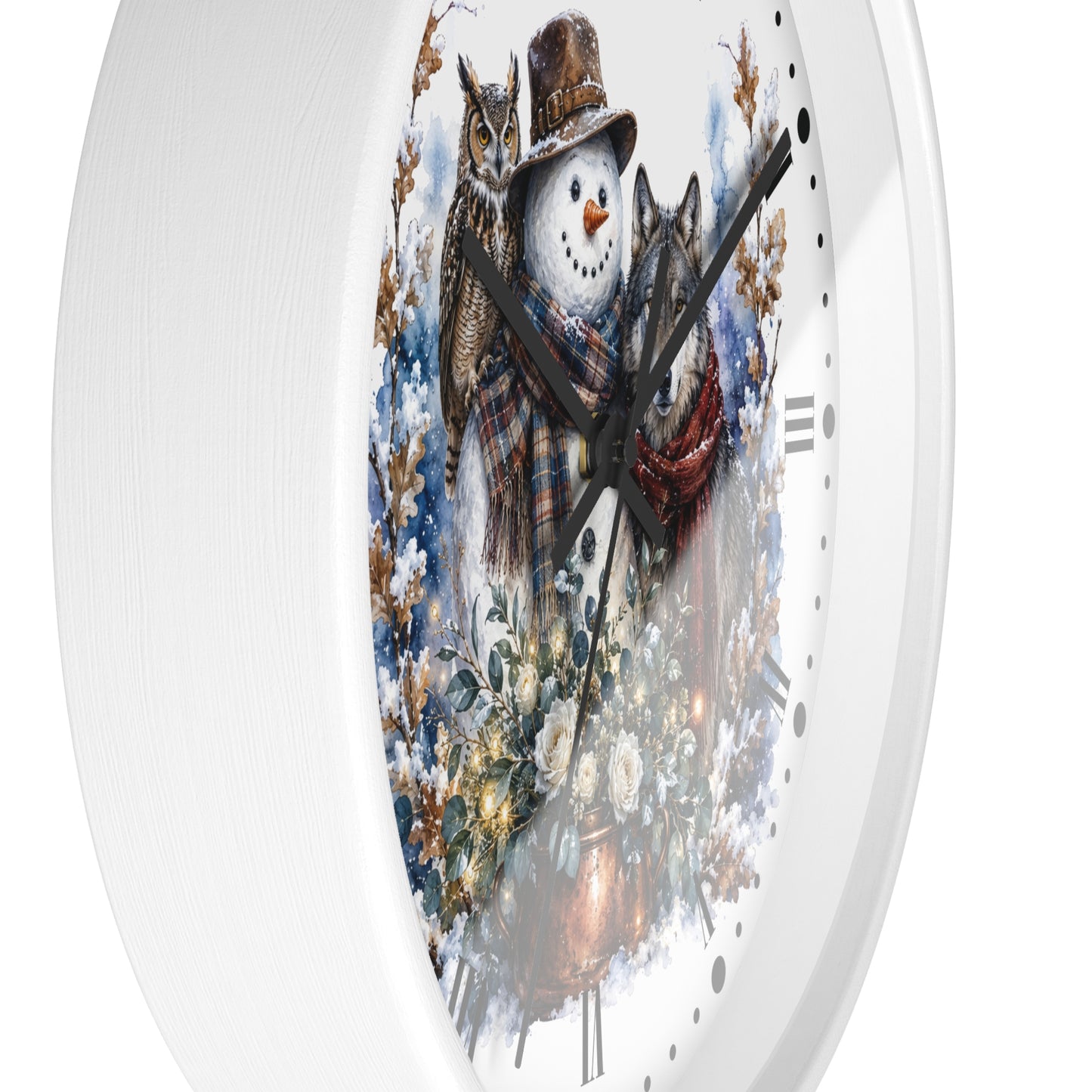 A round white wall clock featuring a winter illustration of a snowman wearing a brown hat and plaid scarf, with a wolf and owl nestled around him in a snowy, floral scene.