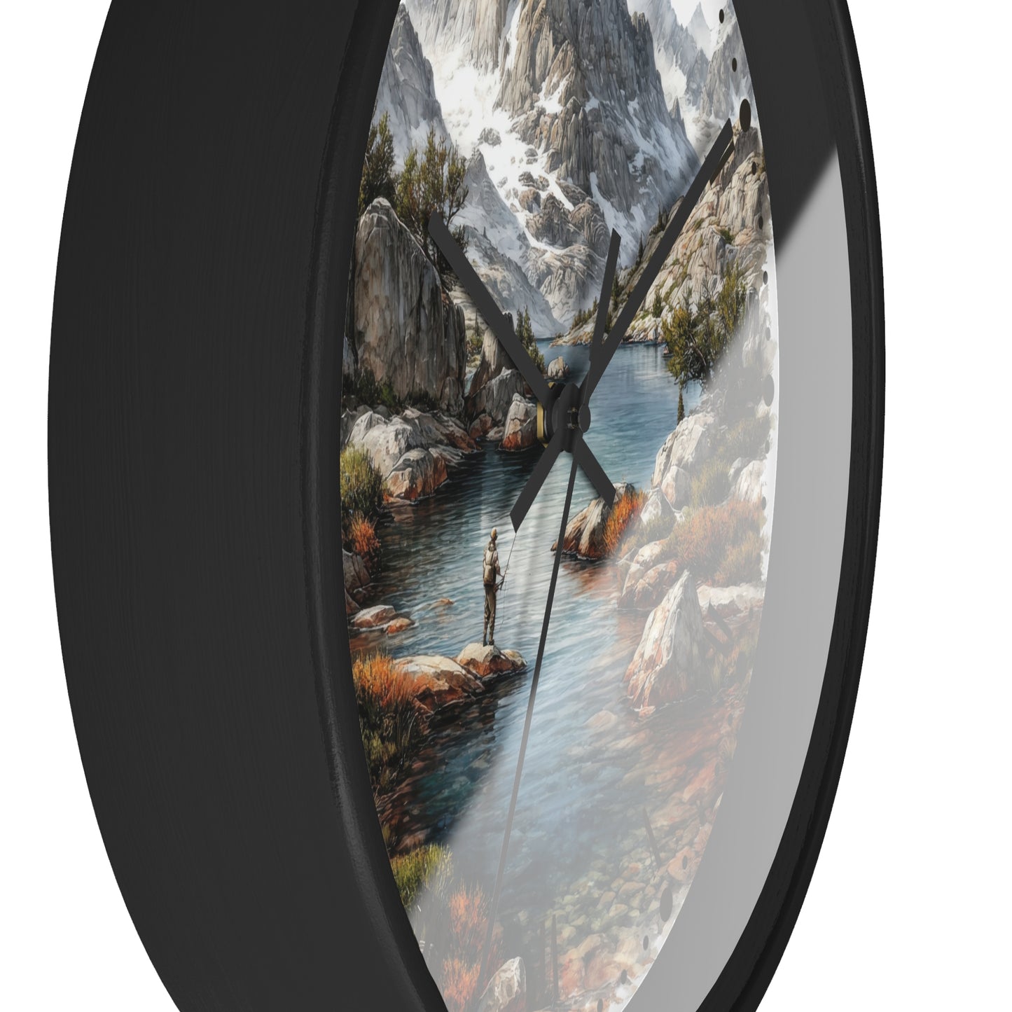 Oval wall clock with a black frame and a scenic landscape print of a mountain river, featuring black clock hands on a white background.