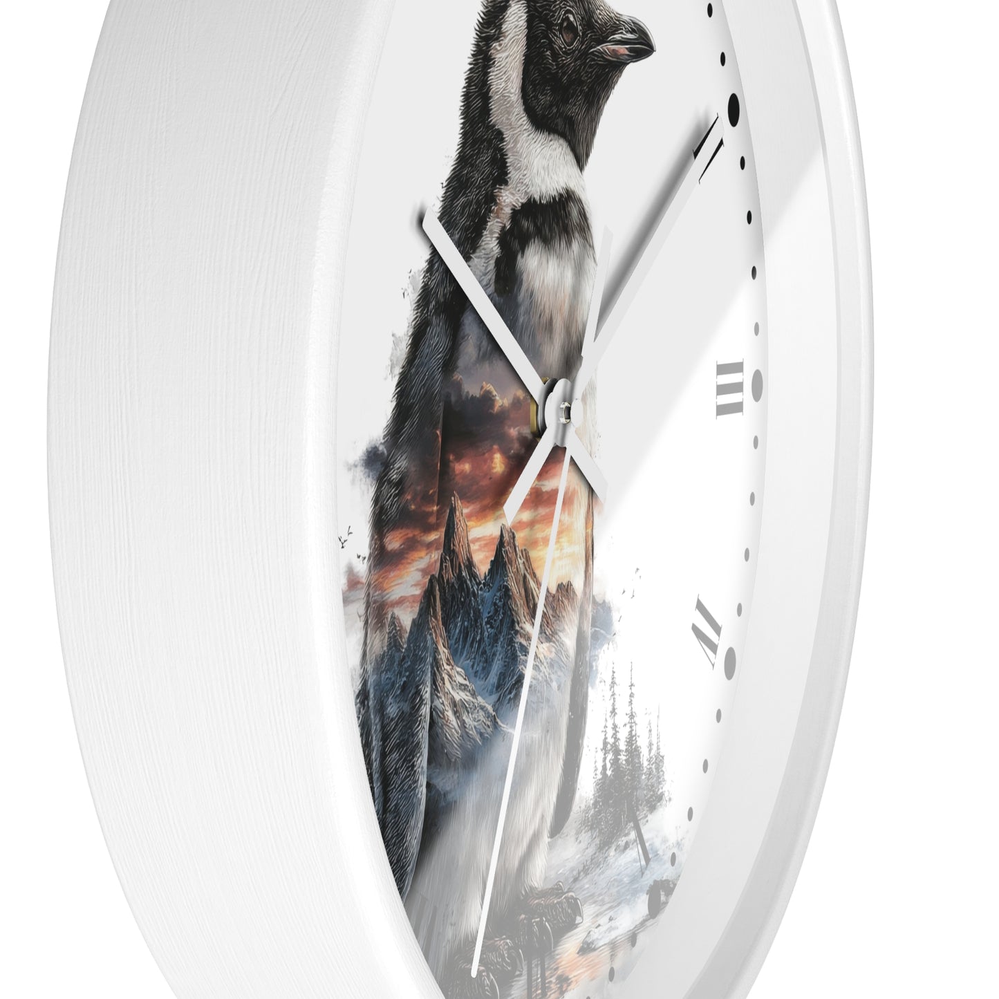 A white round wall clock with a printed design of a penguin standing in front of a dramatic mountain sunset scene.