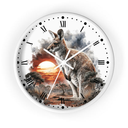 A round wall clock with a white frame and a printed scenic design featuring a kangaroo in an Australian landscape at sunset, with black Roman numerals and hands on a white background.
