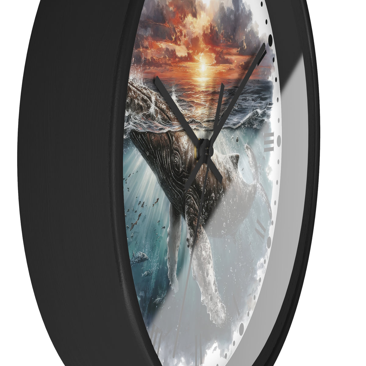 Round wall clock with a black frame and a printed ocean scene featuring a whale and a dramatic sunset sky on the face.