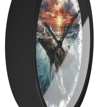 Round wall clock with a black frame and a printed ocean scene featuring a whale and a dramatic sunset sky on the face.