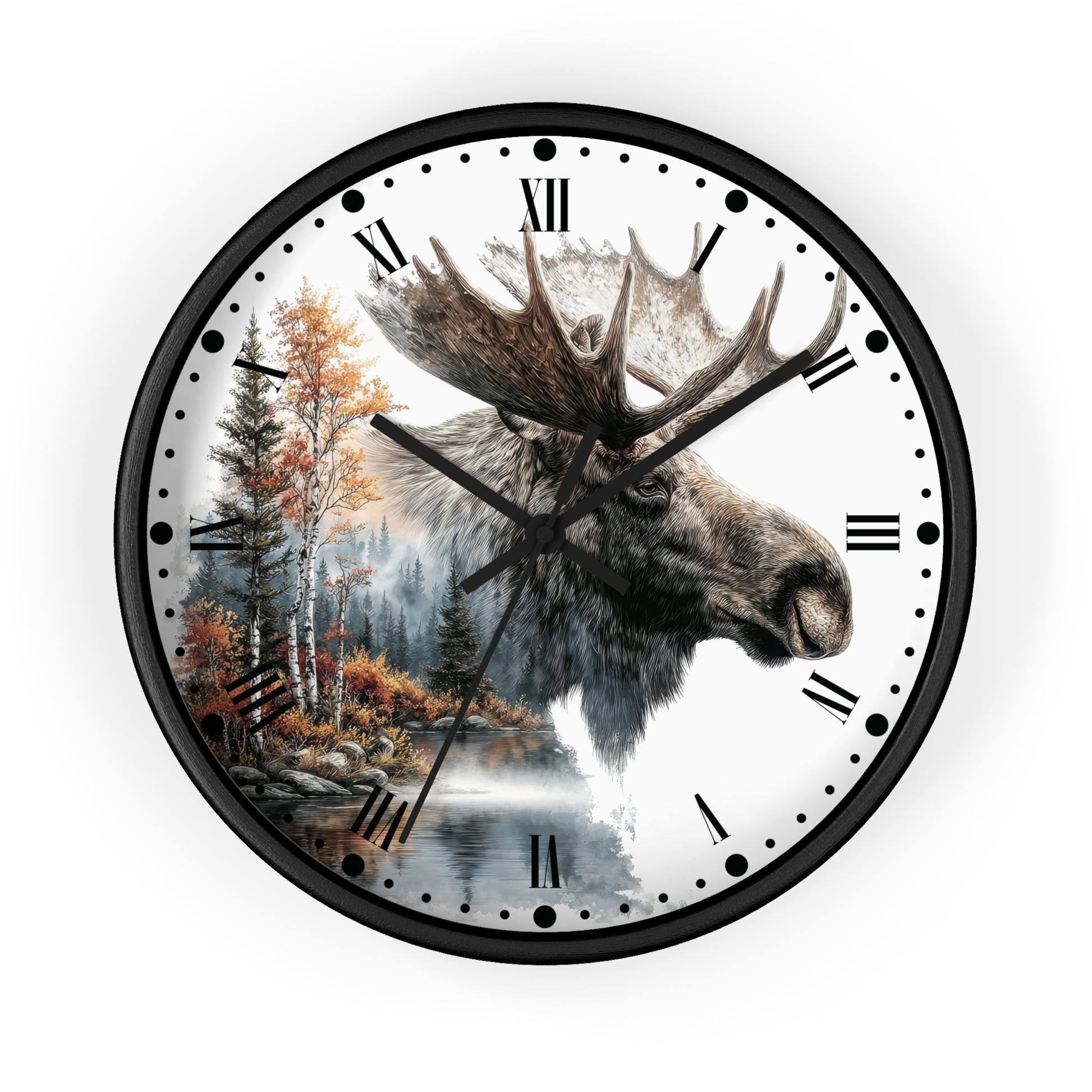 A round wall clock with a black frame and a white face featuring a realistic moose head over a forest and river landscape, with black Roman numerals and hands on a white background.