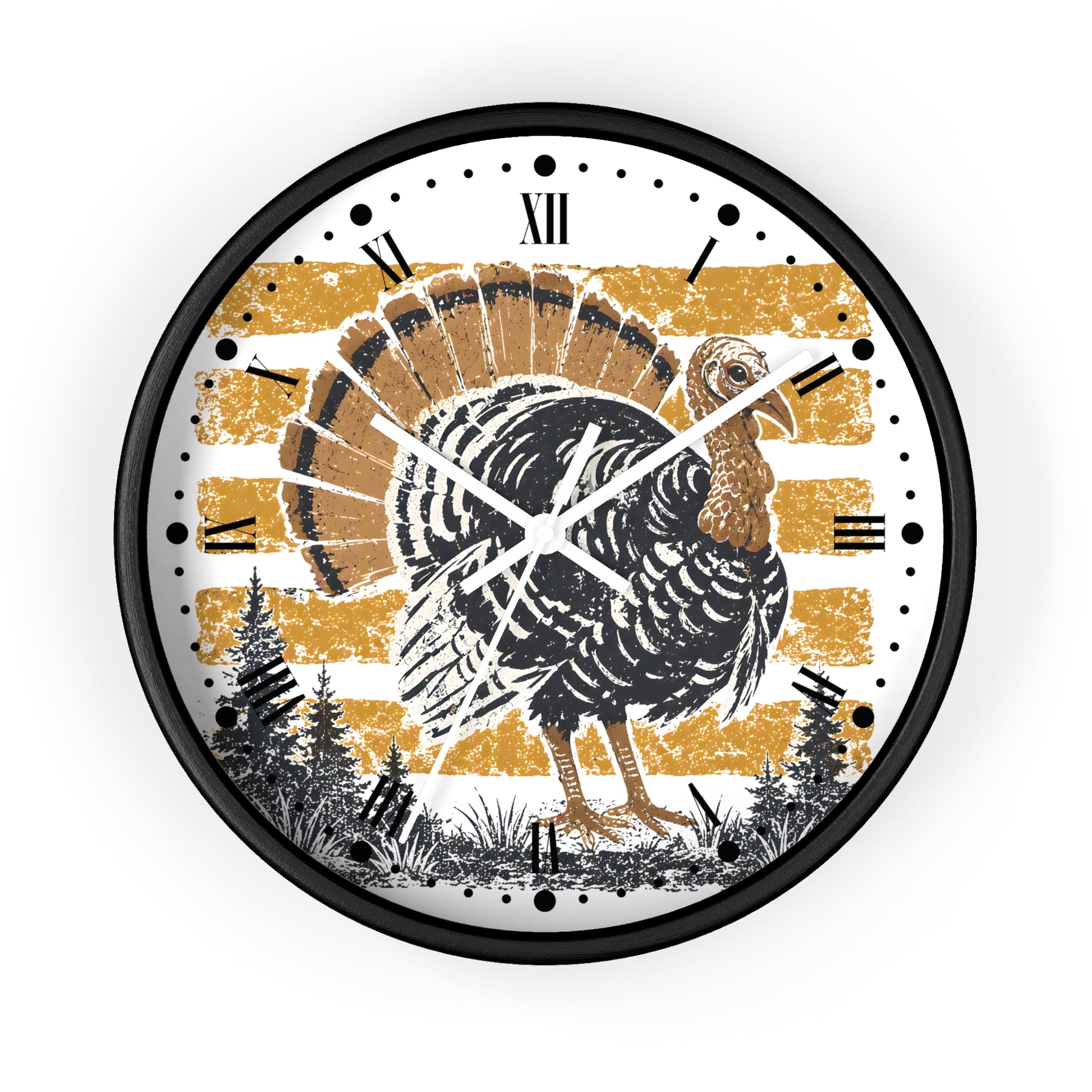 A round wall clock with a black frame and a festive Thanksgiving design. The clock face features a distressed gold and white striped background, a black and brown turkey in the center, and pine trees along the bottom.