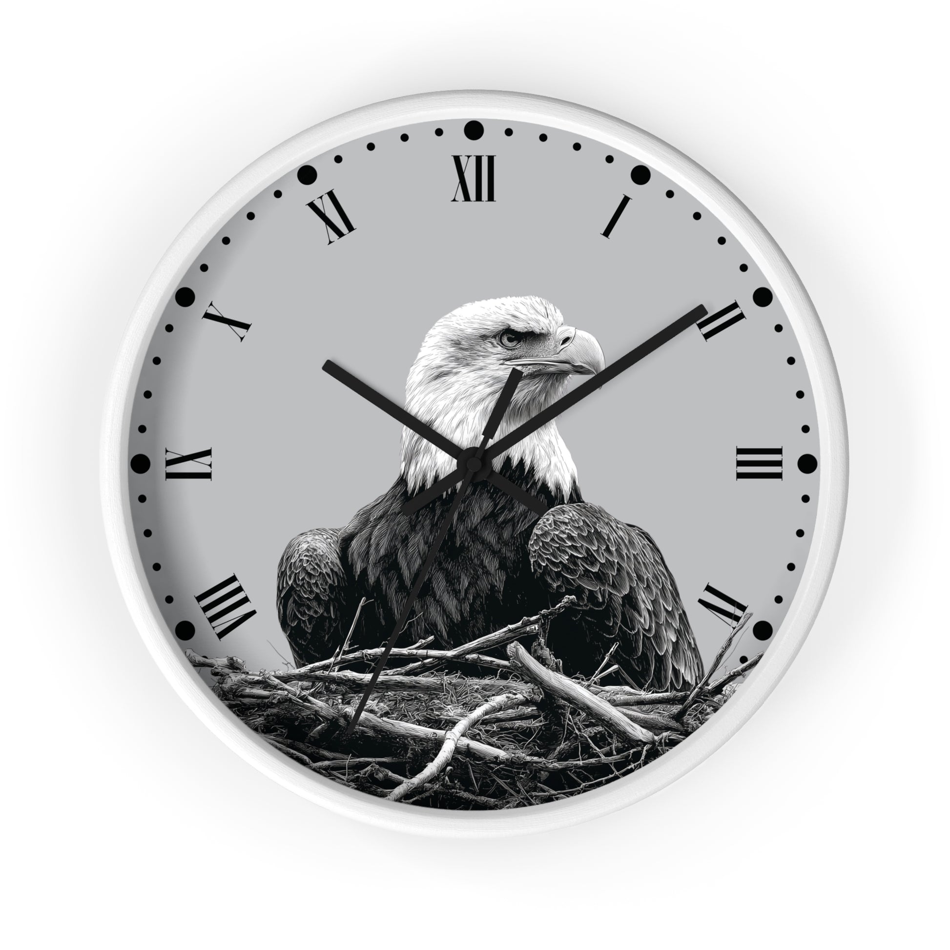 A round wall clock with a white frame and a monochrome photograph of a bald eagle sitting in a nest on the clock face, with black Roman numerals and hands on a light gray background.