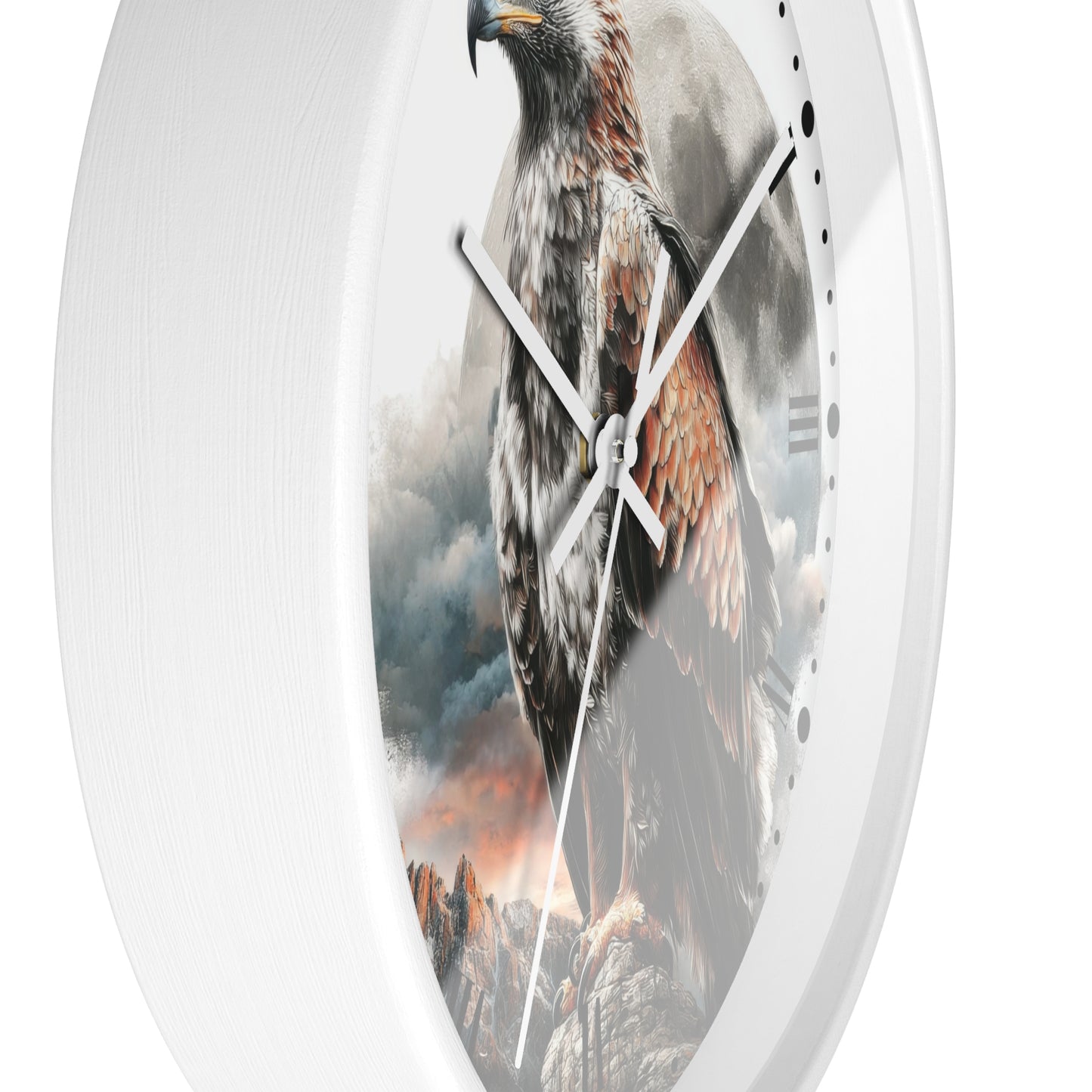 A white round wall clock with a printed design of a large brown and black eagle perched on rocky mountains under a cloudy sky.