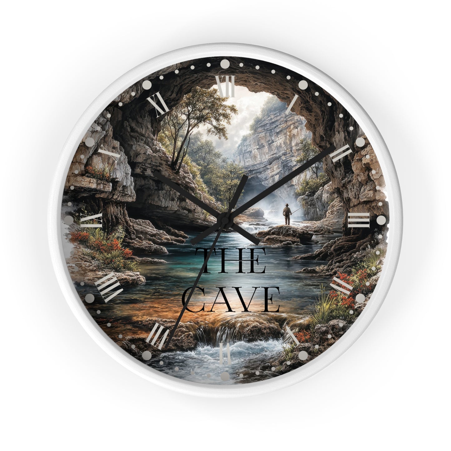 A round wall clock with a white frame and a scenic cave landscape printed on the face. The artwork shows rocky cave walls, a stream, trees, and a small figure standing by the water.