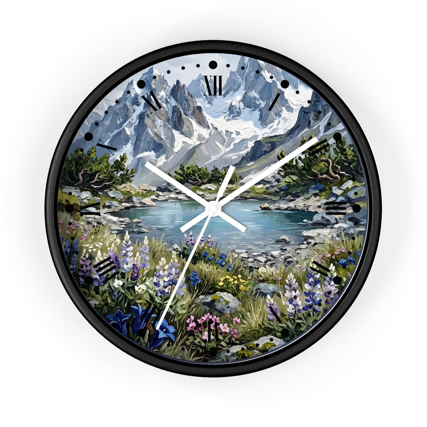 A round wall clock with a black frame and a scenic mountain landscape printed on the face. The artwork shows snow-capped blue-gray mountains, a lake, green trees, and wildflowers in the foreground.