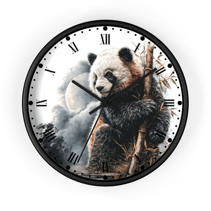 Round wall clock with a black frame and a printed panda illustration on the face, holding bamboo against a cloudy sky with a moon, shown on a plain white background.