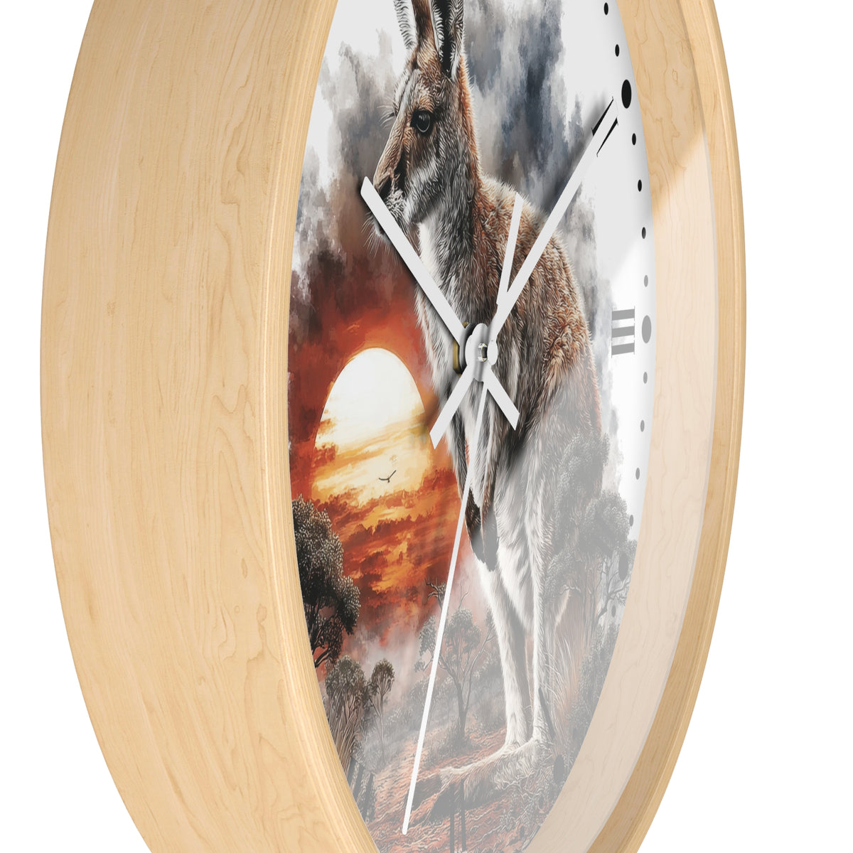 Round wall clock with a light natural wood frame and a printed artwork of a kangaroo in front of a dramatic sunset sky, shown on a white background.