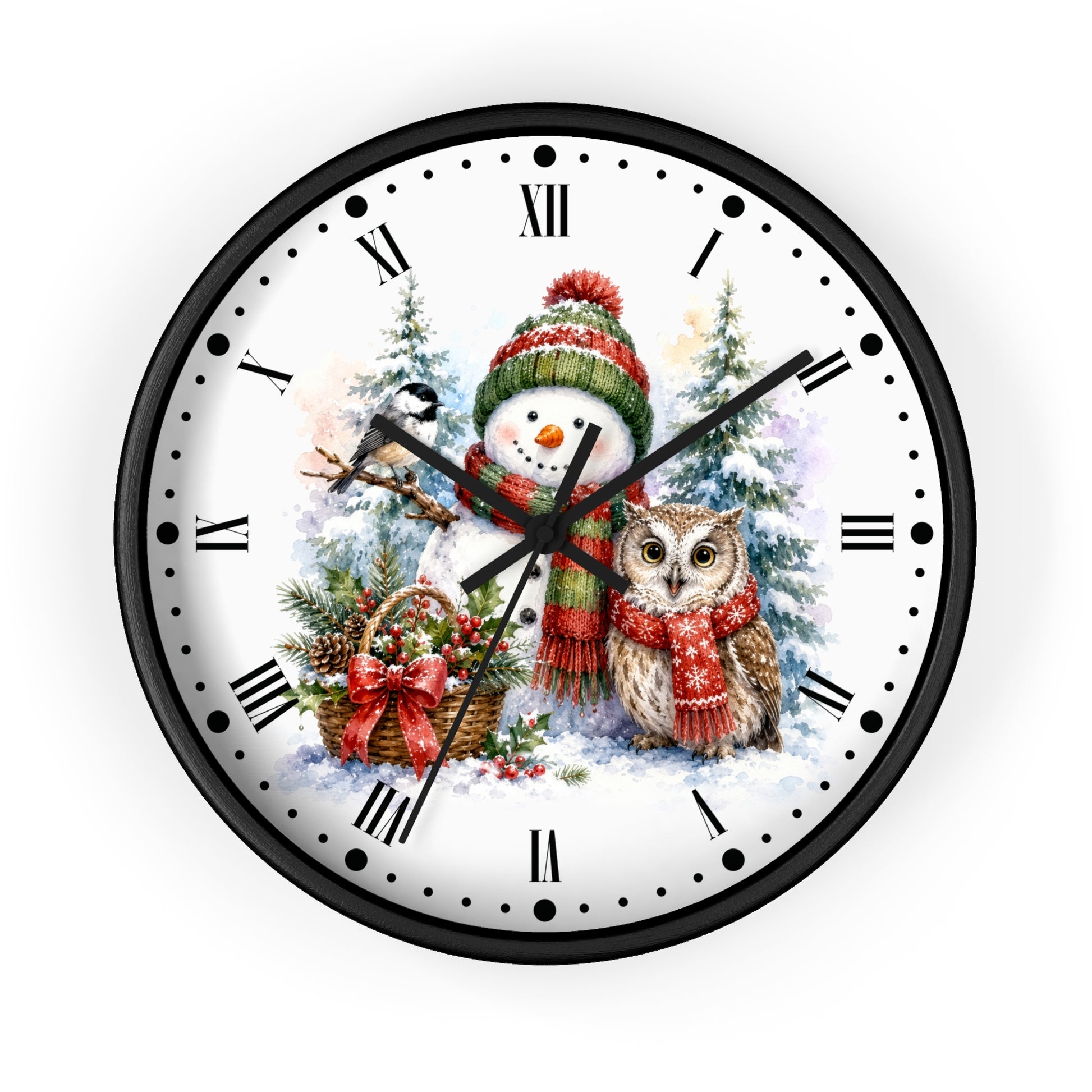 A round wall clock with a black frame and a white face featuring a winter holiday illustration of a snowman in a red and green hat next to an owl in a red scarf, with black Roman numerals and black hands.