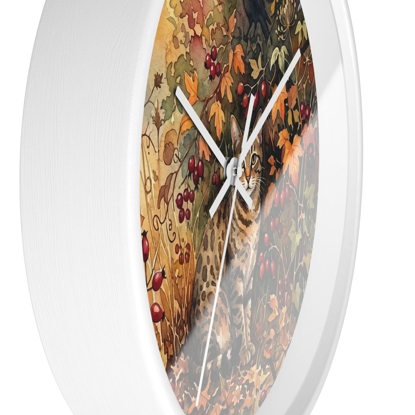 Round wall clock with a white frame and a printed autumn scene featuring a cat among leaves and red berries, shown against a plain white background.