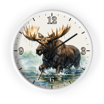 A round wall clock with a white frame and a printed illustration of a moose wading through water, with black Arabic numerals and clock hands on a white background.