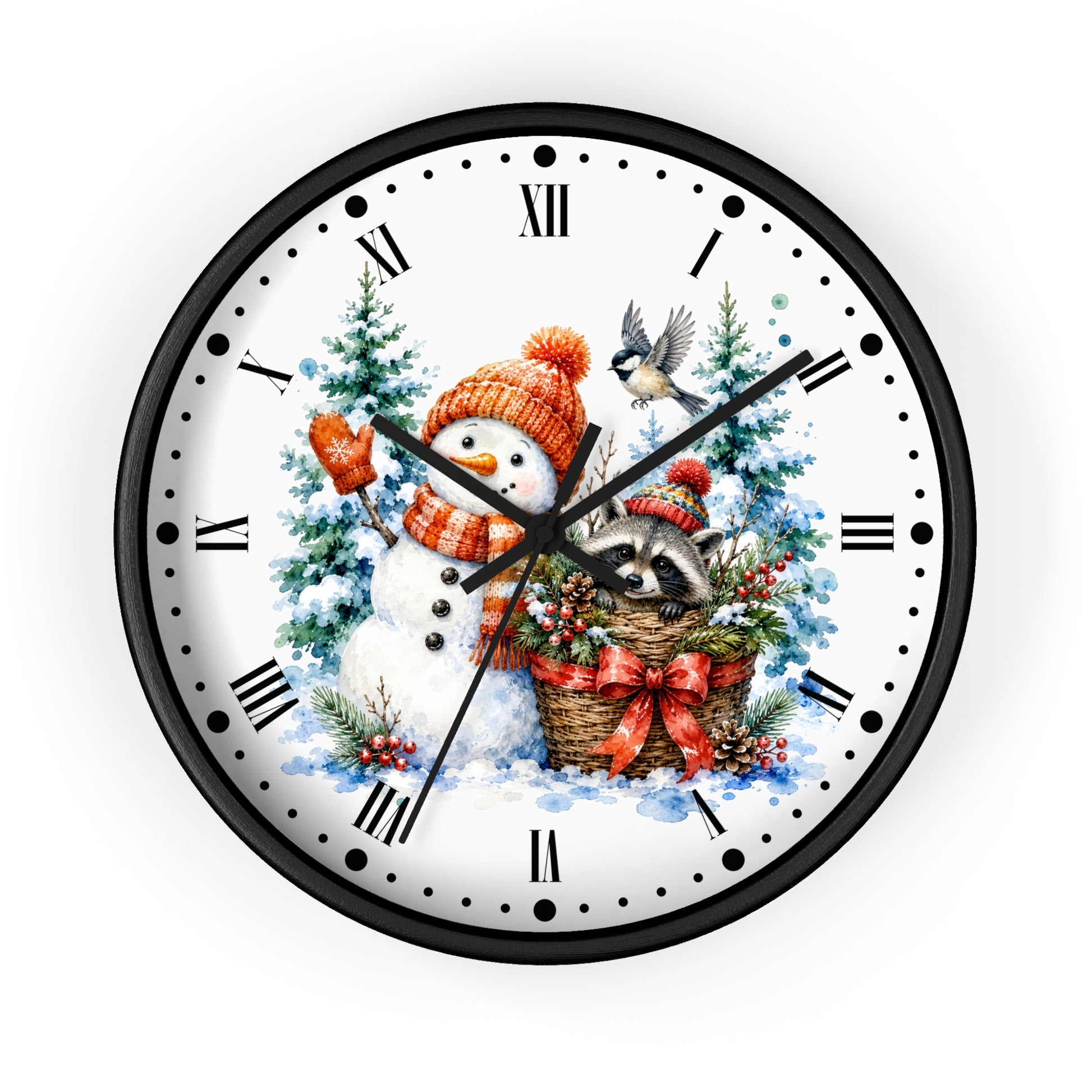 A round wall clock with a black frame and a white face featuring a festive Christmas illustration. The design shows a snowman in an orange knit hat and scarf, a raccoon in a basket with a red bow, evergreen trees, and a small bird, with black Roman numerals and hands on a clean white background.