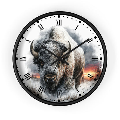 Round wall clock with a black frame and Roman numerals, featuring a large bison illustration over a smoky landscape with a sunset on the clock face, shown on a plain white background.