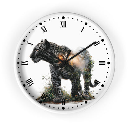 A round white wall clock with black Roman numerals and hands, featuring a printed graphic of a spotted big cat walking through greenery with a warm glowing light behind it.