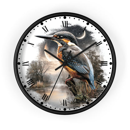 A round wall clock with a black frame and a printed nature scene on the dial, featuring a kingfisher perched over water at dusk with Roman numerals and black hands.