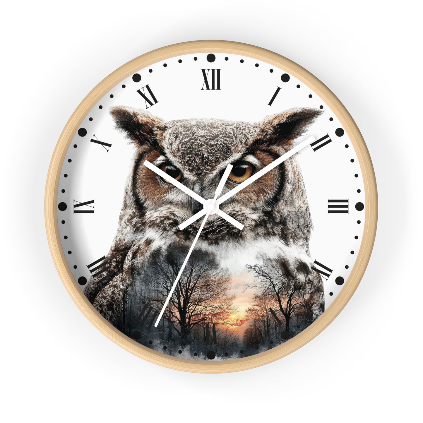 Round wall clock with a light wood frame and a printed owl design over a forest sunset scene on the clock face, shown against a plain white background.