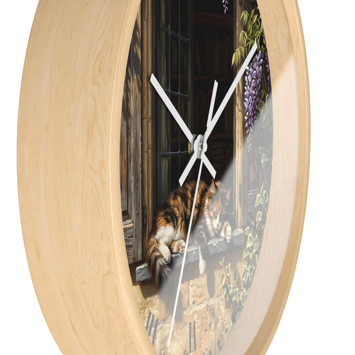 Round wall clock with a light natural wood frame and a printed scene of a calico cat resting on a windowsill, with white clock hands and a thin second hand.
