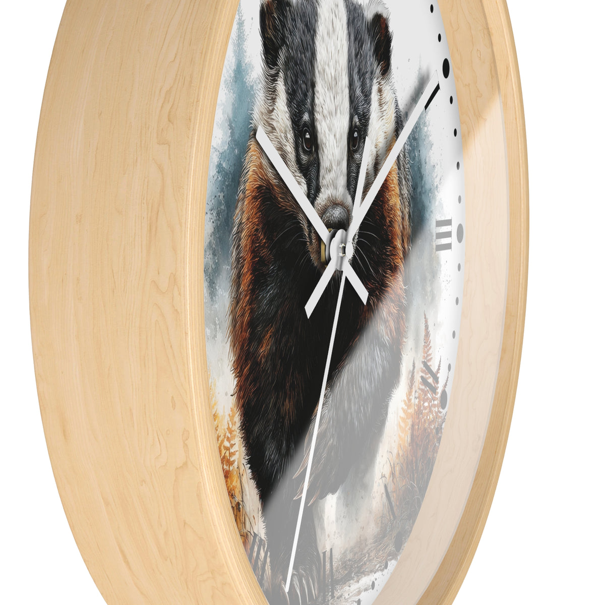 Round wall clock with a light natural wood frame and a printed face showing a badger in a misty forest scene, photographed on a white background.