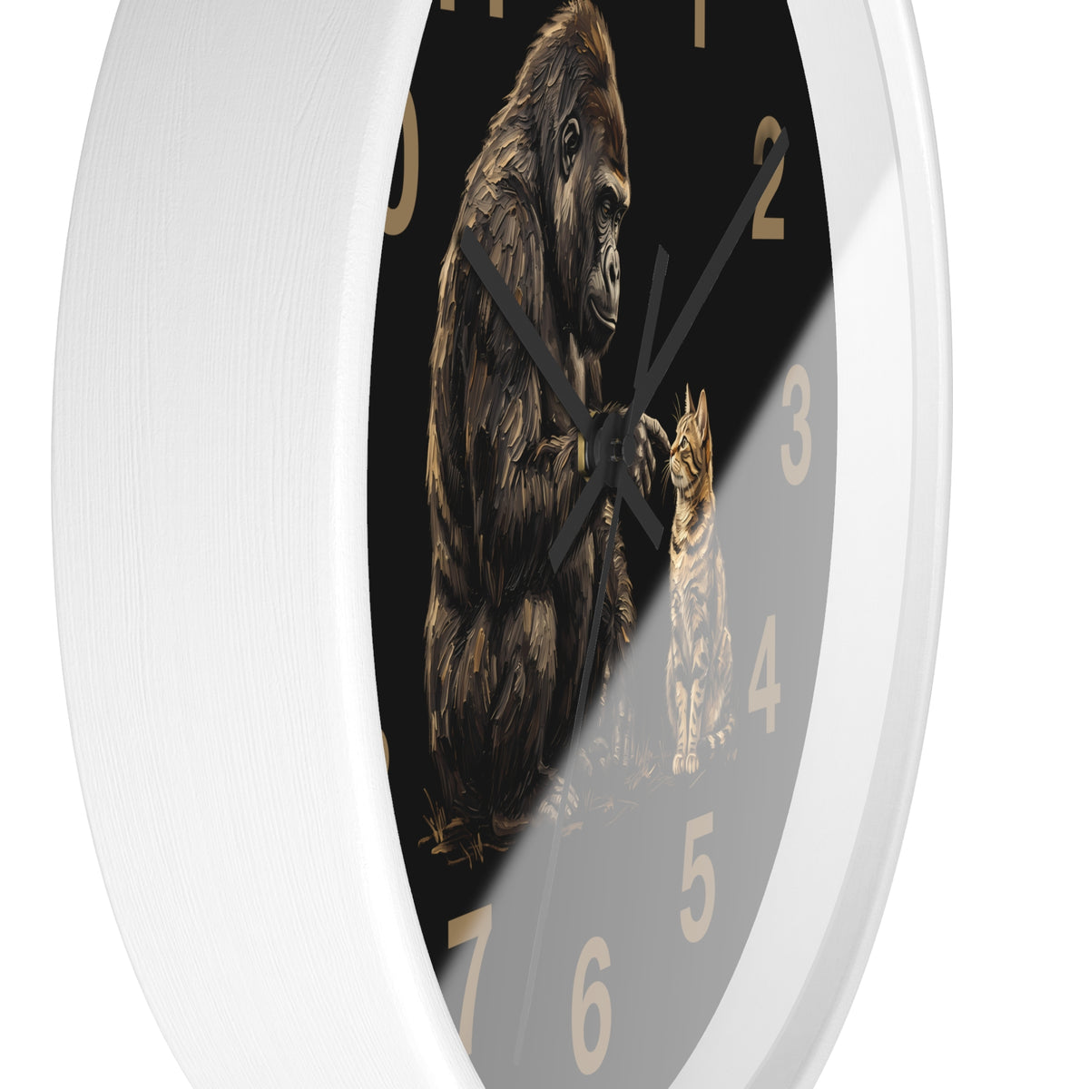 A white round wall clock with a black face featuring an illustration of a gorilla and a cat, with gold-colored numbers.