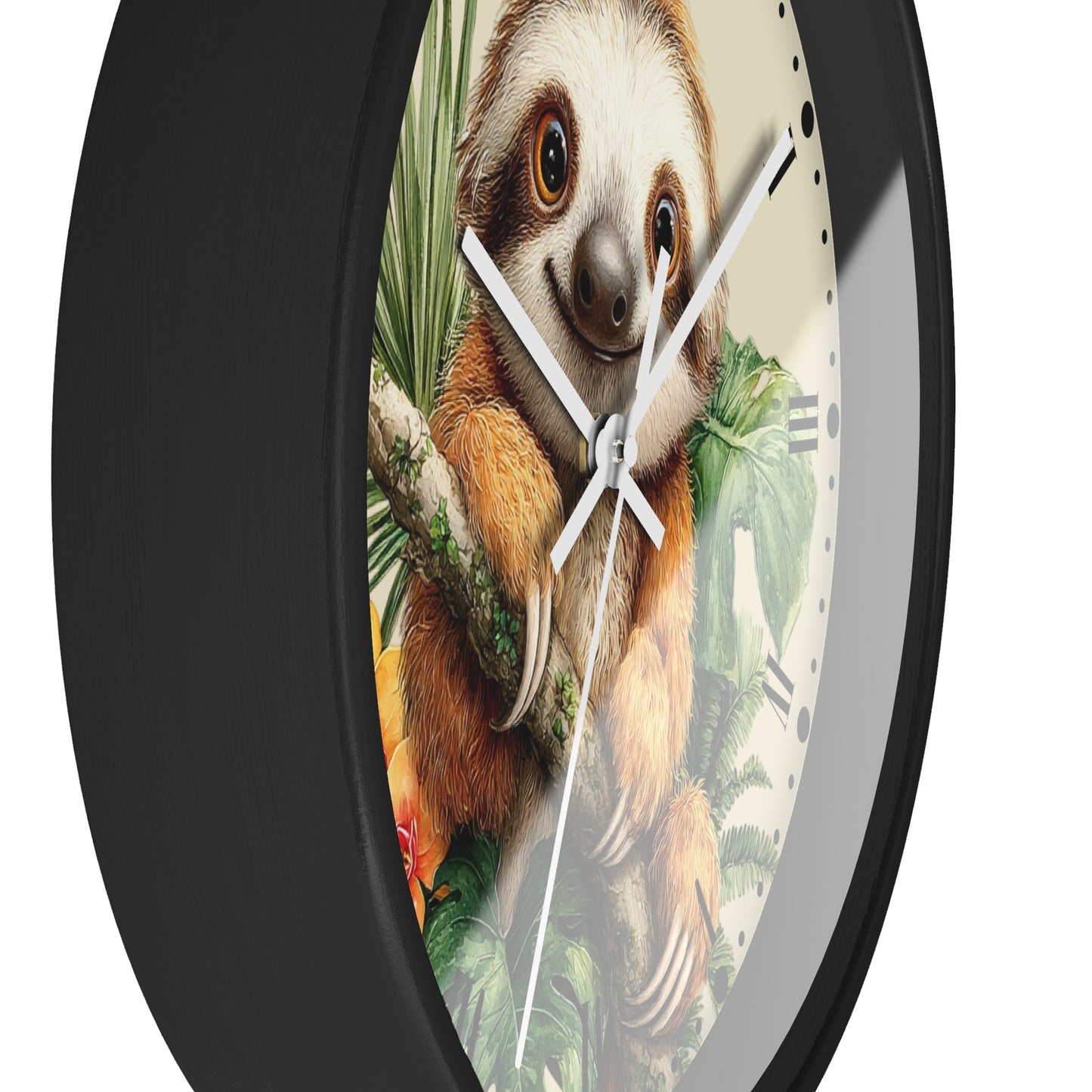 A round wall clock with a black frame and a printed illustration of a sloth hanging from a branch among tropical leaves on the clock face.