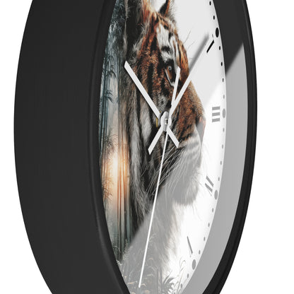 A round wall clock with a black frame and a white face featuring a tiger face over a forest scene. The clock is shown at an angle against a plain white background.