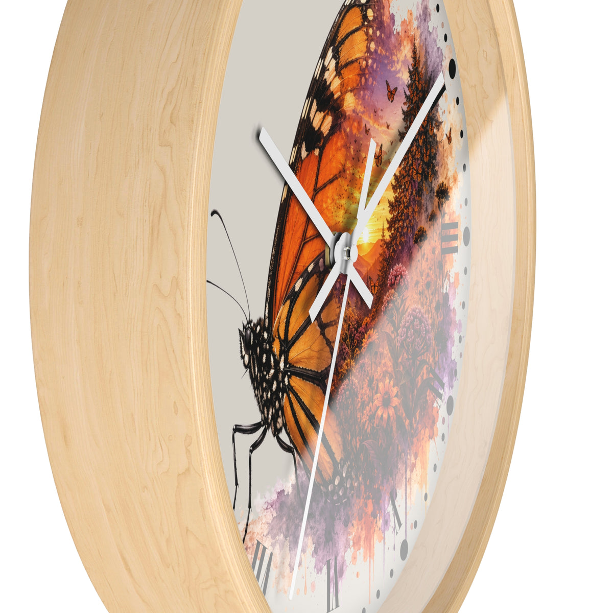 Round wall clock with a light natural wood frame and a central printed design of a monarch butterfly over a colorful watercolor background.