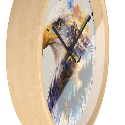 Round wall clock with a light natural wood frame and a printed center featuring a close-up eagle head layered over a mountain and forest landscape, shown on a white background.