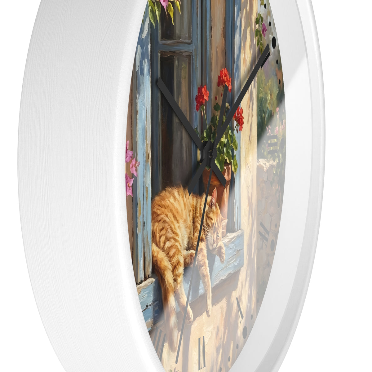 Round white wall clock with a printed illustration of an orange tabby cat resting on a sunlit windowsill beside red flowers and a blue door, shown against a plain white background.