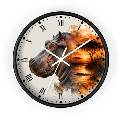 A round wall clock with a black frame and a printed design featuring a hippopotamus head on the left and an orange-toned savanna sunset scene on the right. The clock face is off-white with black Roman numerals and white hands, shown against a plain white background.