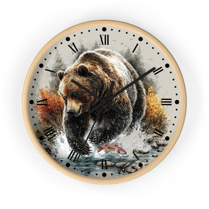Round wall clock with a light natural wood frame and a printed scenic dial featuring a large brown bear walking through water, with Roman numerals and black hands on a white background.