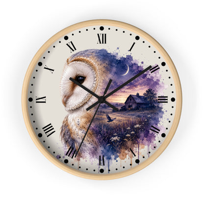A round wall clock with a light wood frame and a printed owl illustration over a watercolor landscape. The clock face has black Roman numerals and black hands, shown against a plain white background.