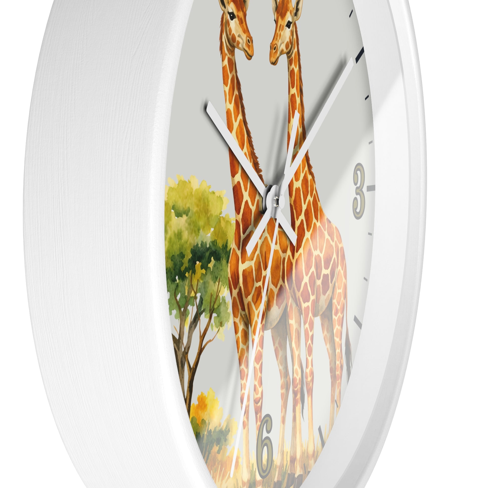 A round white wall clock with a printed giraffe and tree illustration on the face, shown against a plain white background.