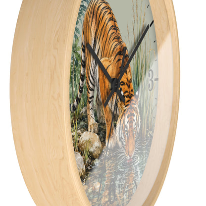 Round wall clock with a light natural wood frame and a printed tiger scene on the face, with black clock hands and partial white numerals visible.