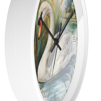 Oval wall clock with a white frame and a printed swan painting on the face, featuring black hands and hour markers.