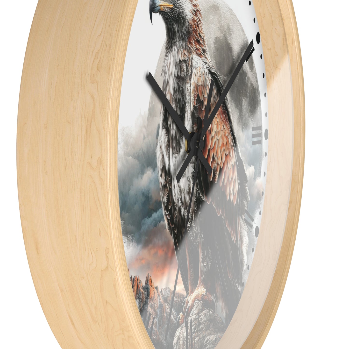 Round wall clock with a light natural wood frame and a printed scenic face showing a large eagle over a smoky mountain landscape, photographed on a white background.