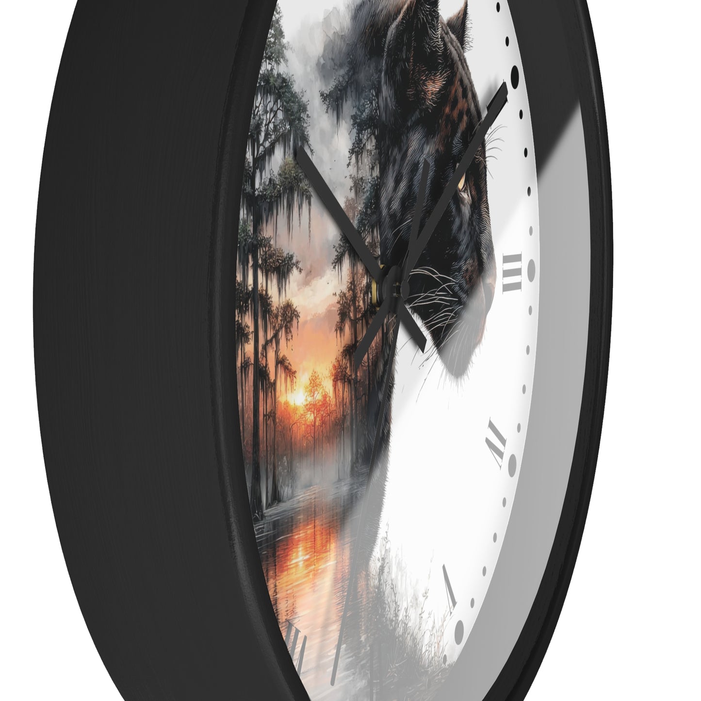 A close-up of a round wall clock with a black frame and a split-face design: one half shows a white dial with black Roman numerals and dots, while the other half features a dark panther head over a misty forest at sunset.