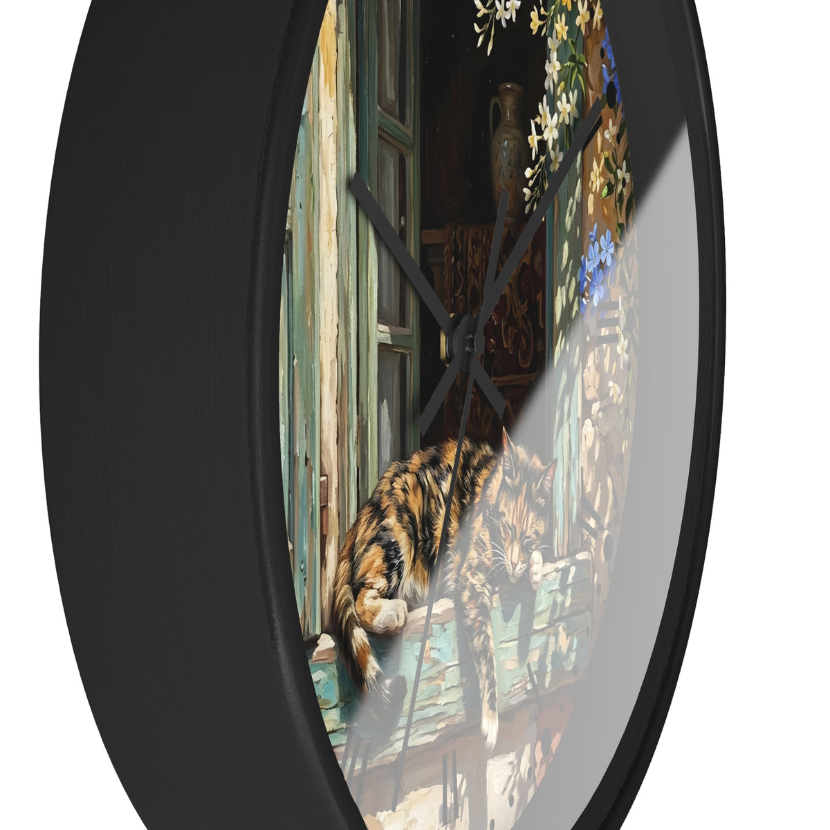 A round wall clock with a black frame and a printed design of a tortoiseshell cat on a window, shown against a plain white background.