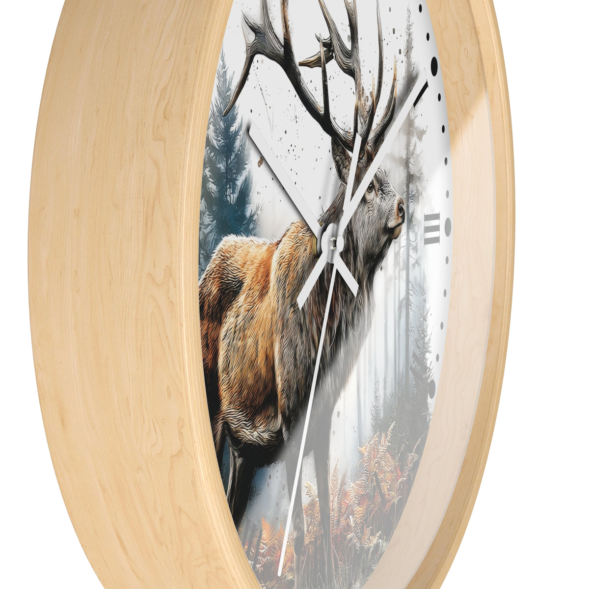 A round wall clock with a light natural wood frame and a printed deer artwork on the face. The deer illustration shows a large brown stag with antlers against a misty forest background, with white clock hands and black hour markers.