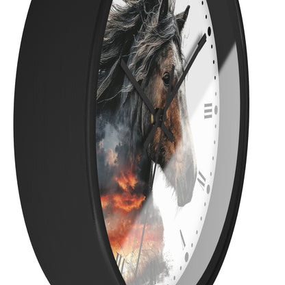A close-up of a round wall clock with a black frame and a white face, featuring a dramatic printed design of a horse's head over a fiery landscape on the left side.