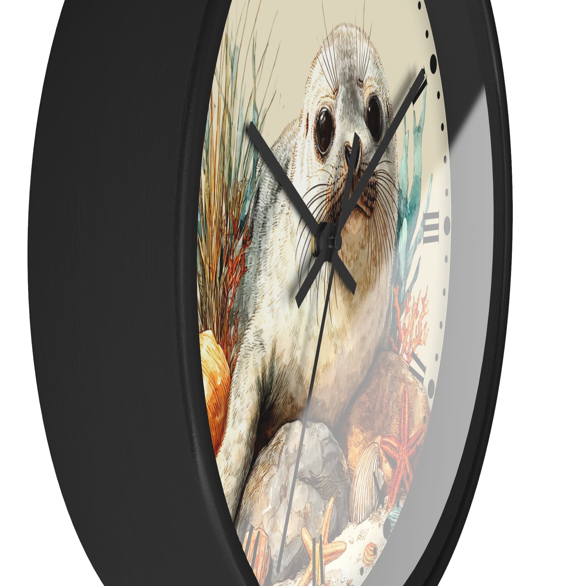 A round wall clock with a black frame and a detailed illustration of a seal on the face, set against a plain white background.