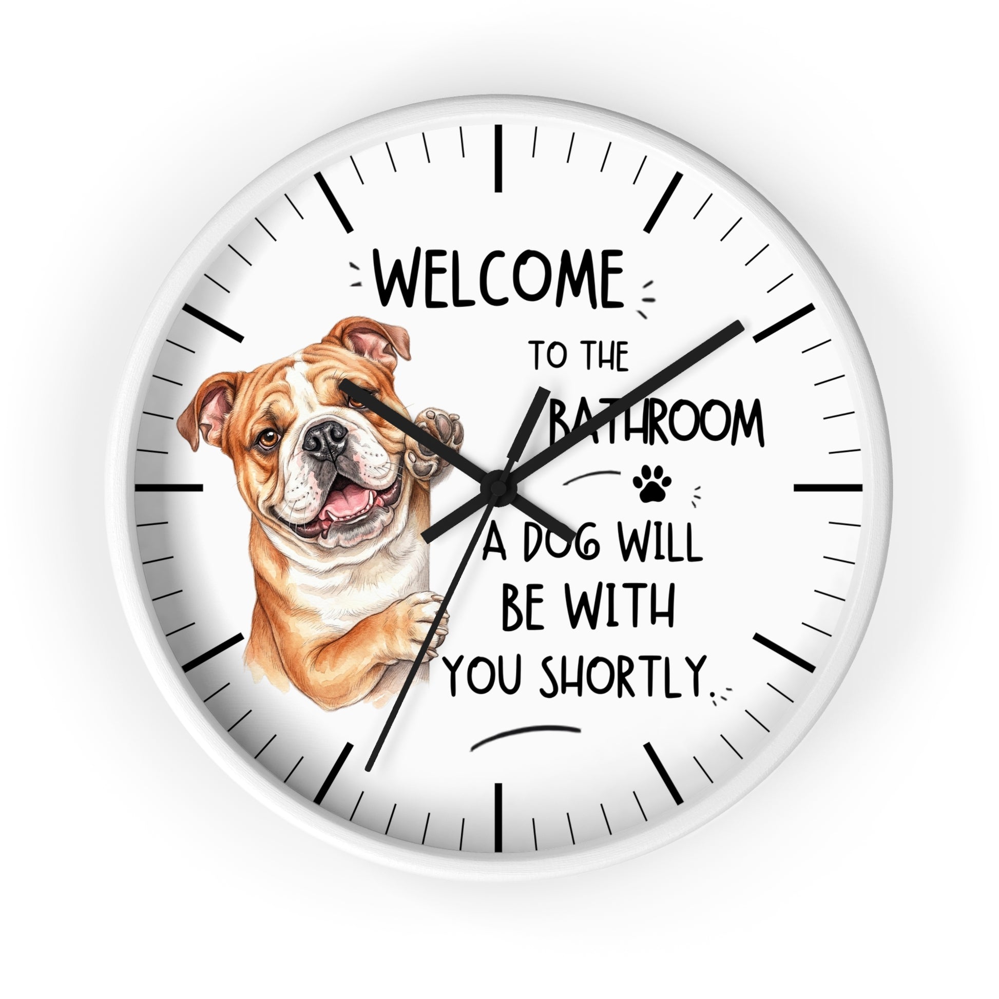 A round white wall clock with black hands and hour markers, featuring a watercolor illustration of a bulldog and the text 'WELCOME TO THE BATHROOM A DOG WILL BE WITH YOU SHORTLY.' on a white background.