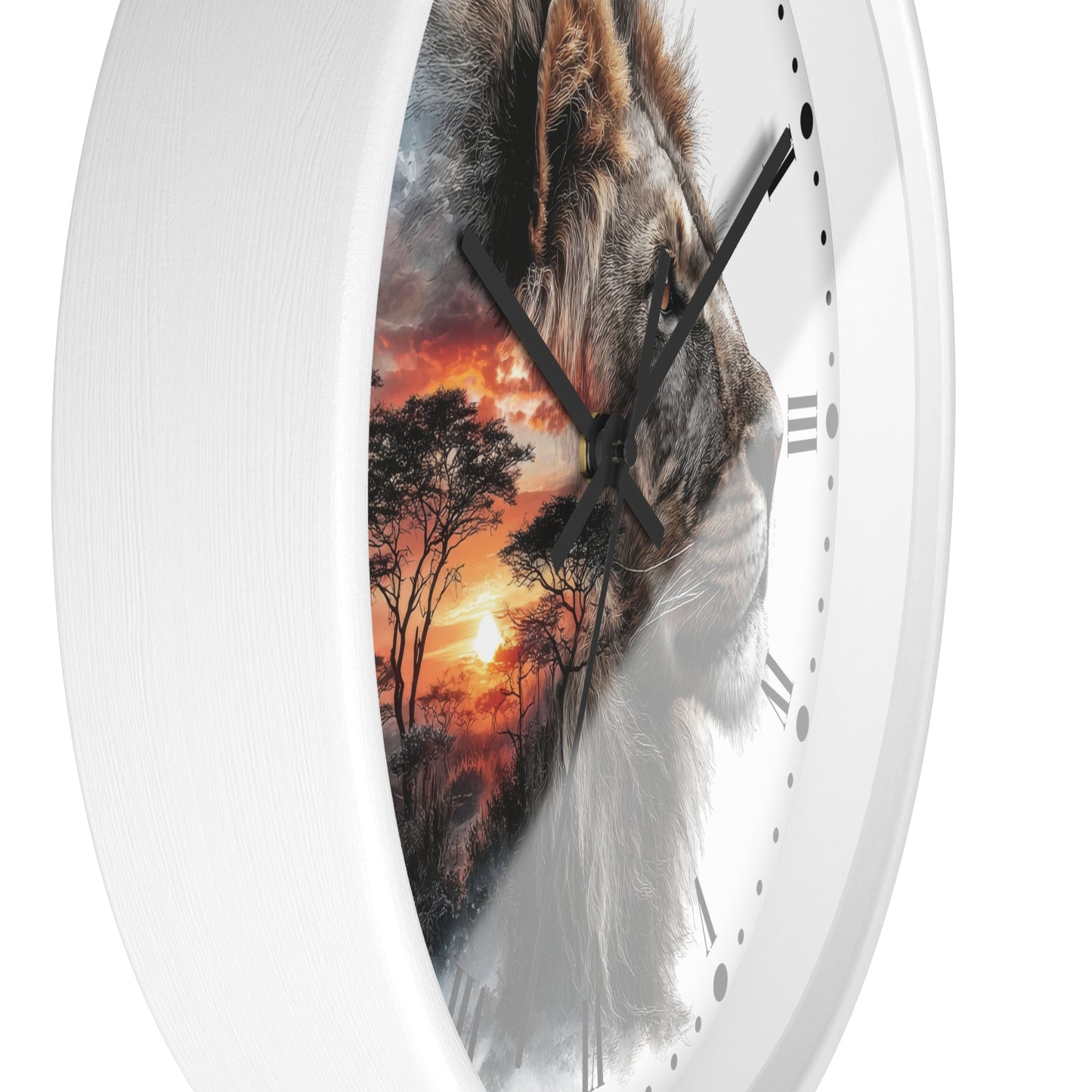 A white round wall clock with a split design: one half shows a realistic lion face, and the other half shows an African savanna sunset scene. The clock has black hands and Roman numeral hour markers.