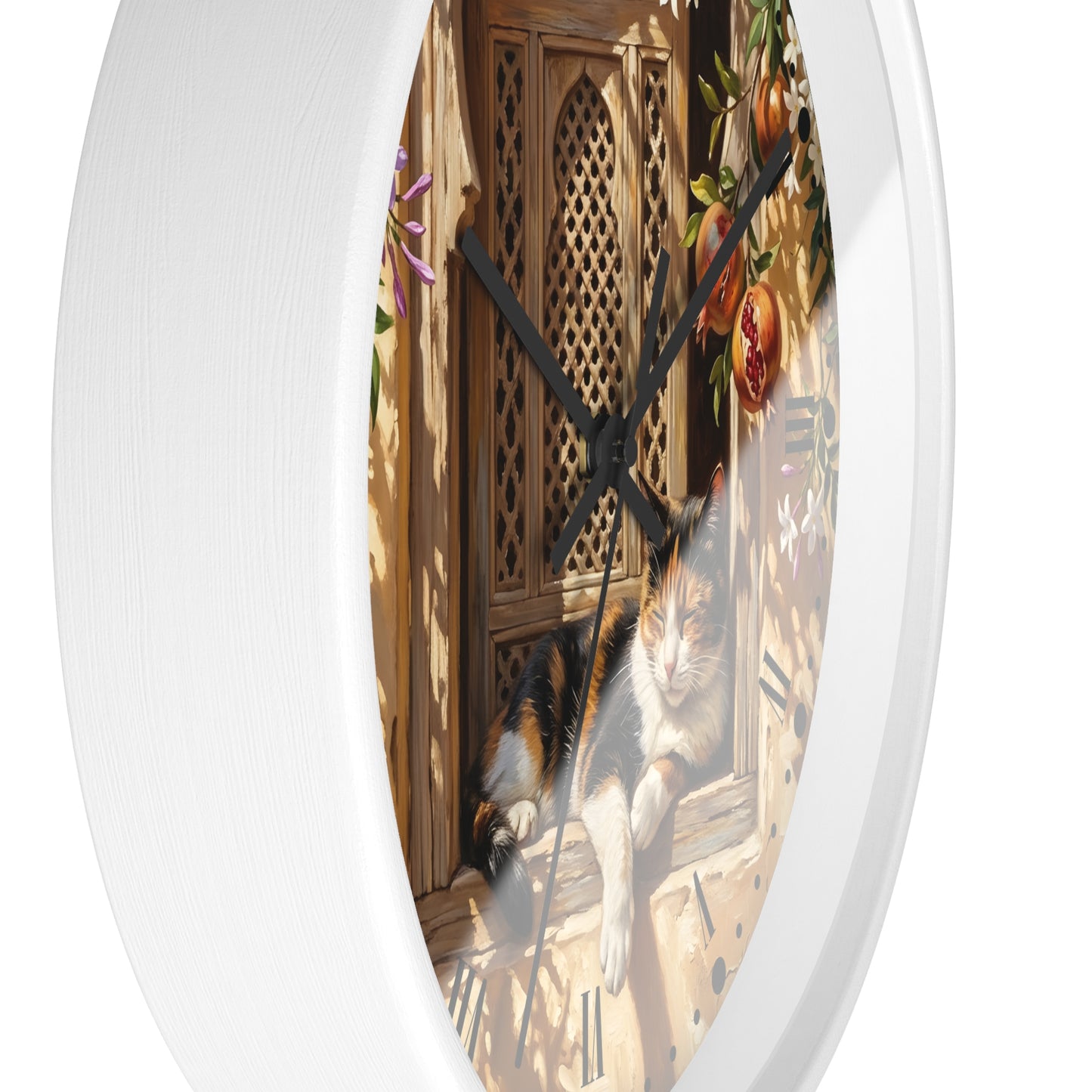 Round wall clock with a white frame and a printed scene of a calico cat lounging on a windowsill next to a wooden door.
